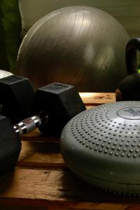 a bunch of gym equipment on a wooden table at Panama Beach Lodge in San Carlos