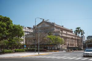 a car parked on a street in front of a building at Pestana Buenos Aires in Buenos Aires
