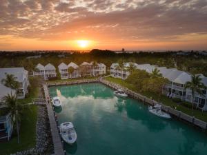 an aerial view of a marina with boats in the water at Hawks Cay Resort in Duck Key