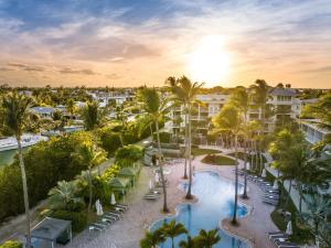an aerial view of a resort with a pool and palm trees at Hawks Cay Resort in Duck Key