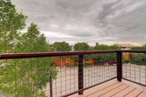 a balcony with a view of a yard at 534 Sun River #8 in Fraser