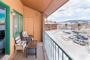 a balcony with a view of a parking lot at 643 Silvercreek Inn Condo in Granby