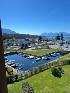 a view of a marina with boats in the water at Aix-les Bains in Aix-les-Bains