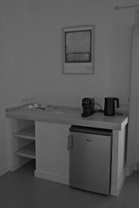 a kitchen with a counter with a appliance on it at LELA'S in Kardamyli