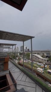 a view of a train station with trains at Bee Home Stay in Greater Noida
