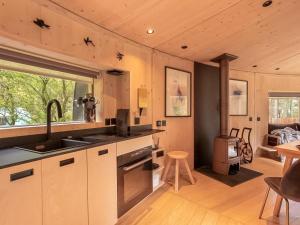 a kitchen with a sink and a stove at Liberty-Qu7629 in Chipping Norton