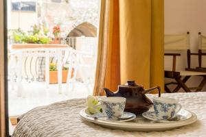 タオルミーナにあるSUITE MARINELLA -TAORMINAの茶鍋