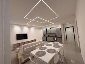 a living room with a couch and a table at Da Nella 2 in Ancona