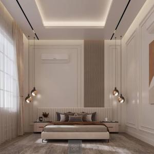 a bedroom with a large bed and lights in it at روف كامل خصيصا لك in Madīnat ash Shurūq
