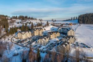 an aerial view of a resort in the snow at Apartament Rajka in Biała Woda