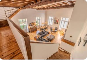 an overhead view of a living room with a staircase at Villa Marisa in Ax-les-Thermes