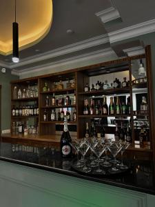 a bar with a lot of bottles of alcohol at Lalaner Hotel in Sisian