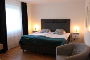 Postel nebo postele na pokoji v ubytování Sturup Airport Hotel