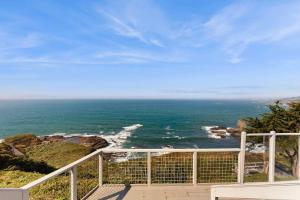 a view of the ocean from a balcony at The Lookout Point in Gualala