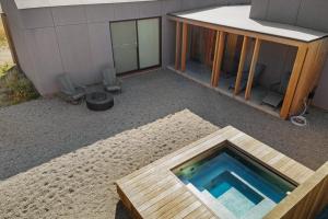 a swimming pool in the middle of a building at Sky Fall in Sea Ranch +23 photos