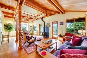a living room with a couch and a table at Shangri-lala in Gualala
