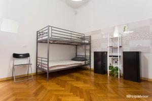 Posteľ alebo postele v izbe v ubytovaní Central Hostel Milano
