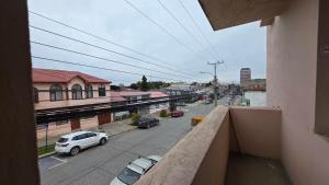 a view of a city street from a balcony at Alojamiento Centro de Punta Arenas in Punta Arenas