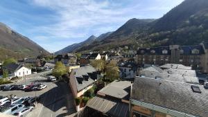 an aerial view of a small town in the mountains at appartement 4 places centre-ville in Cauterets