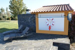 a gazebo with an anchor painted on it at Casa da Eira em Dornes - Casa de campo familiar com piscina in Dornes +40 photos