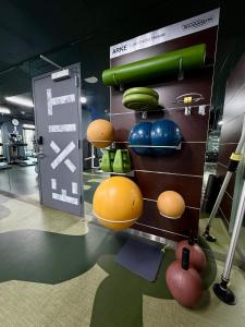 a display in a gym with balls on a wall at Sports Illustrated Resorts Chicago in Chicago
