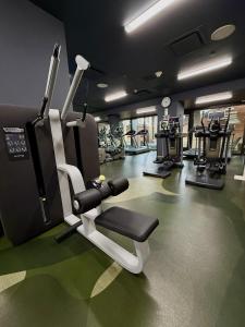 a gym with several tread machines in a room at Sports Illustrated Resorts Chicago in Chicago