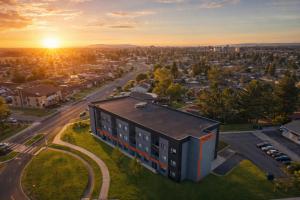 an overhead view of a building in a city at Lux Suites Extended Stay in Thunder Bay