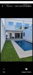 a picture of a house with a swimming pool at Gemela1 in Puerto Peñasco