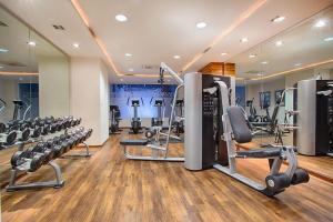 a gym with lots of treadmills and machines at Penthouse Oceanview 1 block Malecon bars shops ZR in Puerto Vallarta