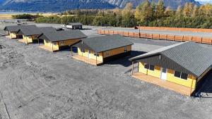 an overhead view of a row of houses in a parking lot at The Cabins at Riptide Resort in Seward