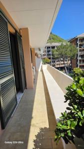 an empty balcony of a building with plants on it at Casa Luisa in Recco