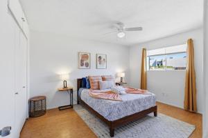 a bedroom with a bed and a window at Tempe Resort, Pool with Diving Board, 4BR in Tempe +21 photos