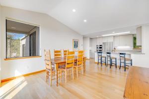 a kitchen and dining room with a table and chairs at Heron's Nest in Sea Ranch