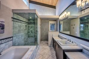 a bathroom with two sinks and a shower at Oceanfront Dream Hideaway and Retreat in Gualala