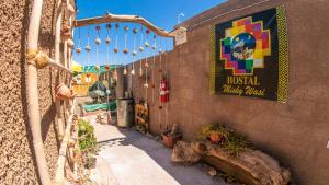 a building with a sign on the side of it at Misky Wasi in San Pedro de Atacama