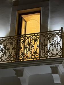 a balcony with a window on a building at SUITE LUX apulia in Massafra