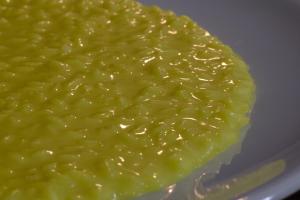 a pile of green food on a white plate at La Maraviglia in Foligno +18 photos
