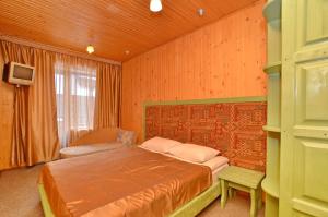 Ένα ή περισσότερα κρεβάτια σε δωμάτιο στο Chaban Aparthotel