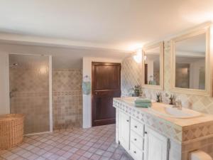 a bathroom with a sink and a shower at Le Mas dormant in Fayence +36 photos