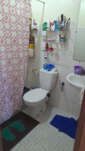 a bathroom with a toilet and a sink at ma chambre in Casablanca