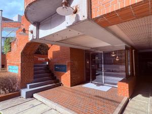 an entrance to a brick building with a staircase at Morioka New City Hotel in Morioka