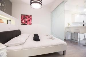 Postel nebo postele na pokoji v ubytování Friday Apartments