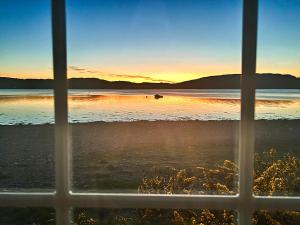 a view of the ocean from a window at Point Park in Taynuilt
