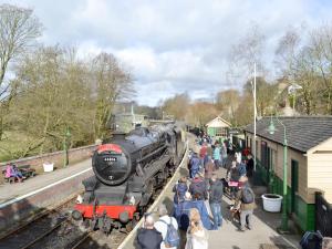 a crowd of people waiting for a train at a train station at Peartree Farm Cottages - Rchm39 in Ebberston +5 photos