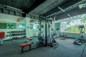 a gym with several treadmills and exercise bikes at Pacifika in Mazatlán