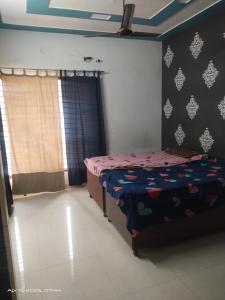 a bedroom with a bed in a room at Guest house one room 9&&&&So&&2 in Kharar