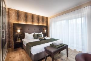 Posteľ alebo postele v izbe v ubytovaní Hotel dasMEI