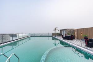 a swimming pool on top of a building at Clarks Inn Bokaro in Bokāro