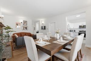 a dining room and living room with a table and chairs at Walk to VA DMC 2BR 2 FULL Baths Midtown in Detroit