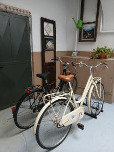 two bikes parked next to each other in a room at Il Cortiletto in Susa
